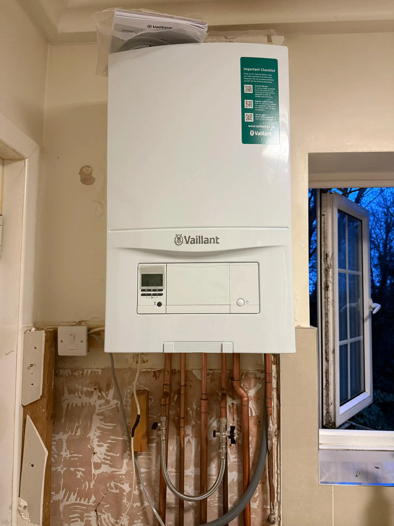 New Vaillant boiler installation with copper pipework in a London home renovation by ODS Plumbing & Construction.