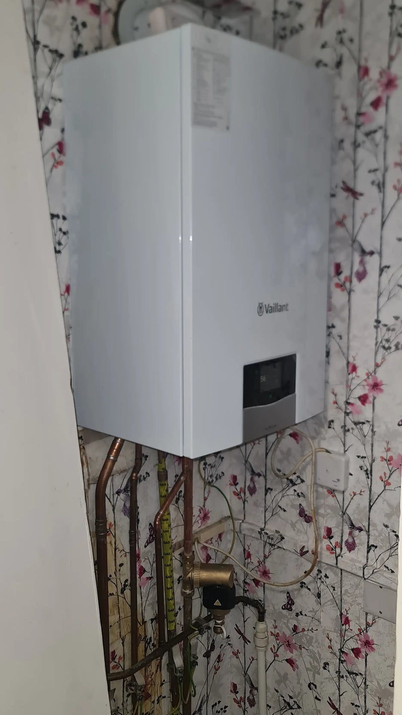 New Vaillant ecoTEC system boiler installation with professional copper pipework and magnetic filter in a London home by ODS.
