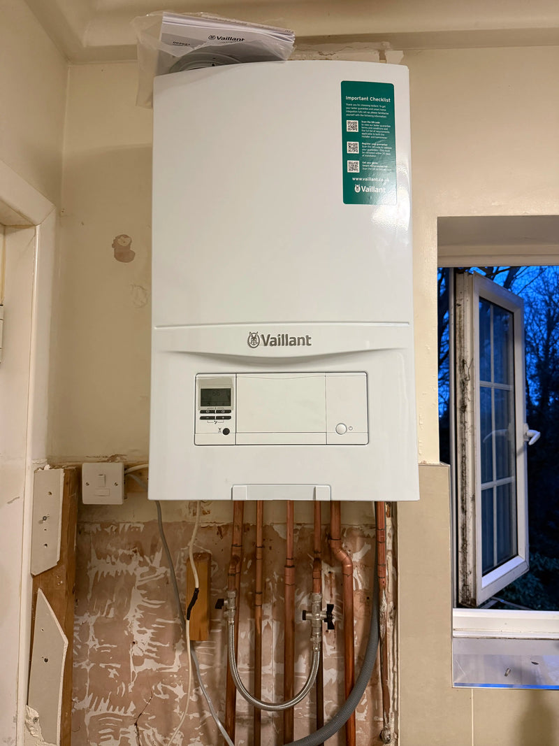 New Vaillant ecoTEC system boiler installation with professional copper pipework and filling loop in a London home by ODS.